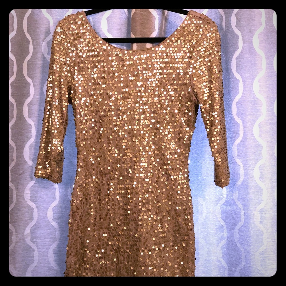 Gold open back cocktail dress